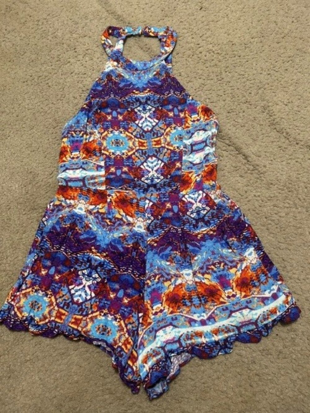 Forever 21 abstract halter romper features a bold blue, orange, and purple. (M)